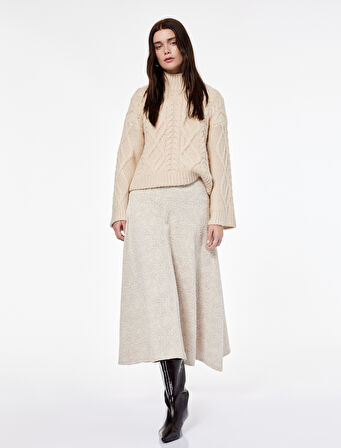 Koton X Şahika Ercümen - Dokulu Asimetrik Kesim Midi Etek