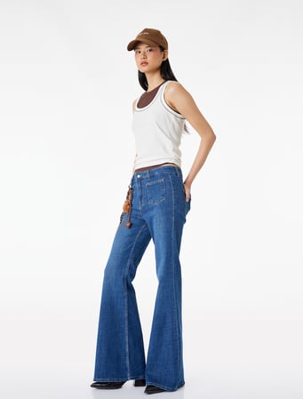 Dar Kesim Cep Detaylı Düğmeli İspanyol Paça Denim Pantolon - Flare Jeans