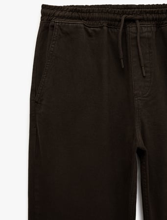 Pamuklu Cepli Bol Kalıp Beli Bağcıklı Jean Pantolon