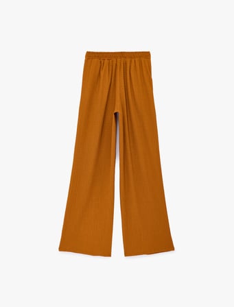 Bürümcük Dokulu Kumaş Pile Detaylı Cepli Geniş Paça Pantolon