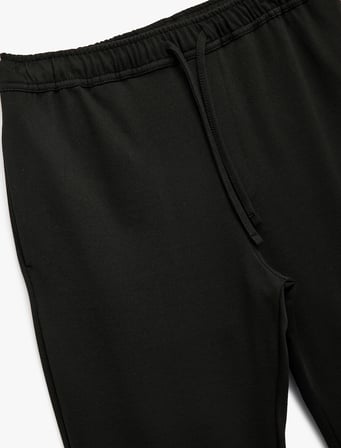 Straight Fit Pike Kumaş Cep Detaylı Rahat Kesim Beli Bağcıklı Pantolon