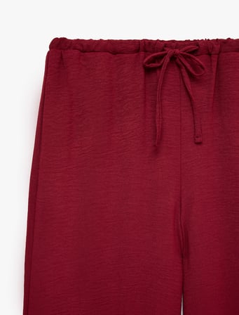 Keten Görünümlü Beli Bağcıklı Cepli Düz Geniş Paça Pantolon