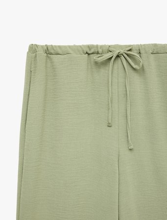 Keten Görünümlü Beli Bağcıklı Cepli Düz Geniş Paça Pantolon