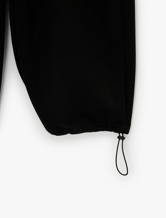 Aerobin Kumaş Rahat Kalıp Beli Bağcıklı Cepli Balon Pantolon