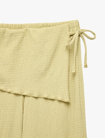 Bürümcük Kumaş Beli Bağcık Detaylı Geniş Paça Etekli Pantolon