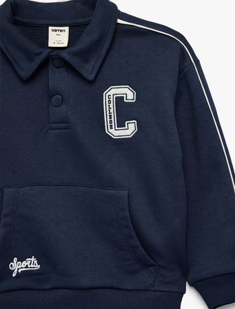 Uzun Kollu Kanguru Cepli Nakış Detaylı Oversize Polo Yaka Sweatshirt