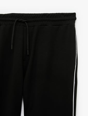 Regular Fit Biyeli Cepli Beli Bağcıklı Eşofman Altı