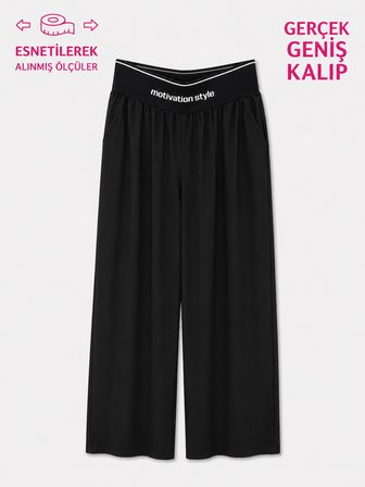 Büyük Beden Beli Lastikli Saten Likra Cepli Bol Kesim Kadın Pantolon