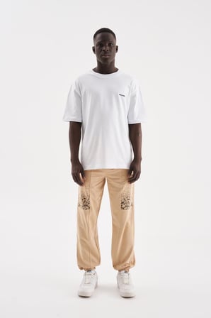 Erkek Aesthetic Dreams Baskılı Organik Pamuklu Jogger Eşofman Altı Bej
