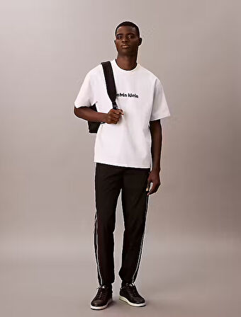 CALVIN KLEIN Erkek Marka Logolu Büzgü Bel Ve Retro Yan Şeritli Yumuşak Naylon Siyah Eşofman Altı LV04RC522G UB1