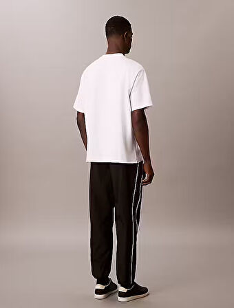 CALVIN KLEIN Erkek Marka Logolu Büzgü Bel Ve Retro Yan Şeritli Yumuşak Naylon Siyah Eşofman Altı LV04RC522G UB1