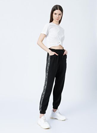 Tommy Jeans DW0DW12155BDS  Normal Bel Relaxed Siyah Kadın Pantolon