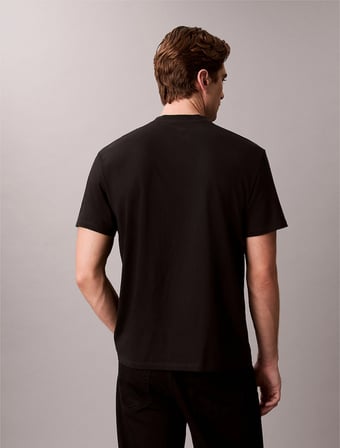 Calvin Klein Kısa Kollu 20s LN Calvin College Grafik Baskılı Erkek Siyah T-shirt LV04RE810G-UB1