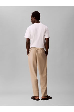 TAPERED TECH KNIT PLEATED PANT