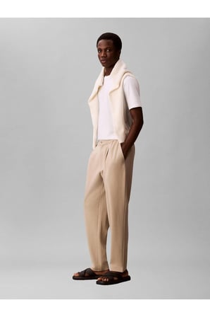 TAPERED TECH KNIT PLEATED PANT