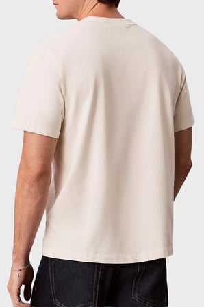 Calvin Klein Logolu % 100 Pamuk Relaxed Fit Bisiklet Yaka T Shirt LV04RH257GYAS Erkek T SHİRT LV04RH257G YAS KREM