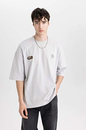 DeFacto Loose Fit Bisiklet Yaka Sırt Baskılı Kısa Kollu Tişört B8950AX24SMGR184