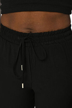 KADIN BELİ LASTİKLİ RAHAT KALIP DÜZ RENK PANTOLON