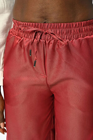 KADIN BELİ LASTİKLİ BOL PAÇA PARLAK KUMAŞ DÜZ RENK PANTOLON