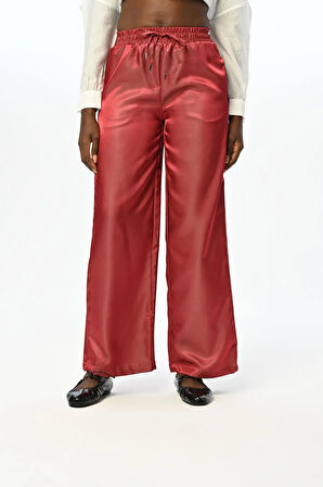 KADIN BELİ LASTİKLİ BOL PAÇA PARLAK KUMAŞ DÜZ RENK PANTOLON