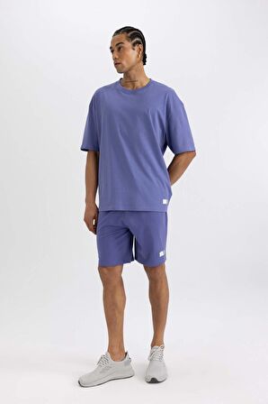 DeFactoFit Slim Fit Dar Kesim Cepli Baskılı Sporcu Şort A1625AX24SMPR484