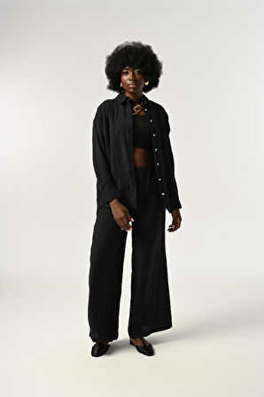 KADIN DÜĞME DETAYLI KIRIŞIK KUMAŞ DÜZ RENK GÖMLEK