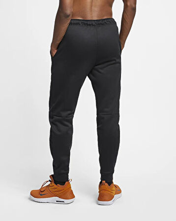 Nike Therma-FIT Bileğe Doğru Daralan Standart Kesim Erkek Eşofman Altı