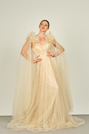 Ömür Inn Kadın Kolu Tül ve Otrişli Fiyonk Süslemeli Uzun Abiye Elbise 4118 Şampanya