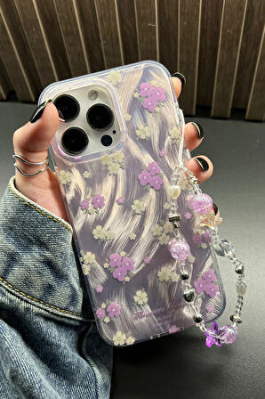 iPhone 16 Pro Uyumlu Lila Çiçekli Desenli Boncuklu Bilek Askılı Charmlı Kılıf