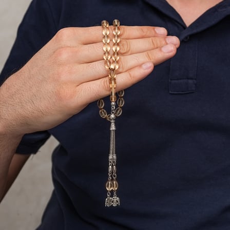 Metal Püsküllü Şeffaf Sıkma Kehribar Tesbih