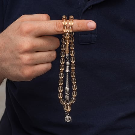 Metal Püsküllü Şeffaf Sıkma Kehribar Tesbih