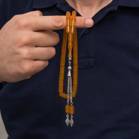 💎 Premium Parlak ve Şık Metal Püsküllü 7x11 mm Kesme Sıkma Kehribar Tesbih