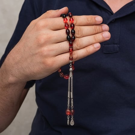 Metal Püsküllü Siyah ve Ateş Tonlu Sıkma Kehribar Tesbih