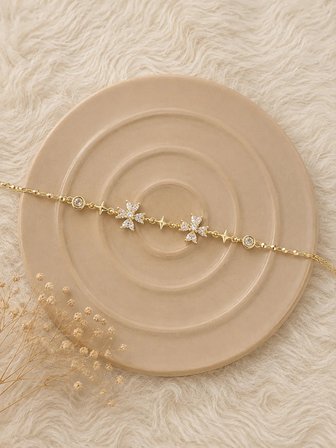 💎 Premium Parlak Gold Renk Çiçek ve Yıldız Figürlü Zirkon Taş Detaylı Bijuteri Kadın Bileklik (22cm)