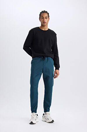 DeFactoFit Sporcu Jogger Eşofman Altı Standart Fit Üç Cepli Beli Bağcıklı Lastikli Paça D3741AX24WNBE821