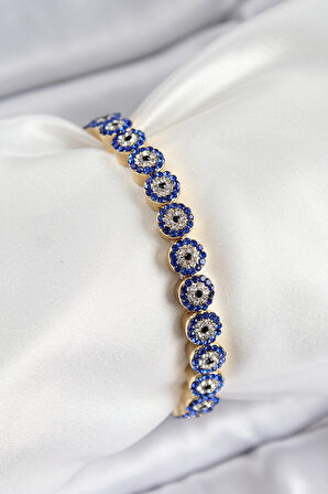 Pirinç Zirkon Taşlı Lacivert Nazar Model Gold Renk Lastikli Kadın Bileklik