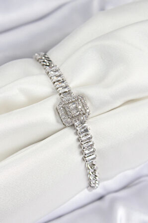 Pirinç Zirkon Taşlı Su Yolu Detaylı Baget Model Gümüş Renk Kadın Bileklik