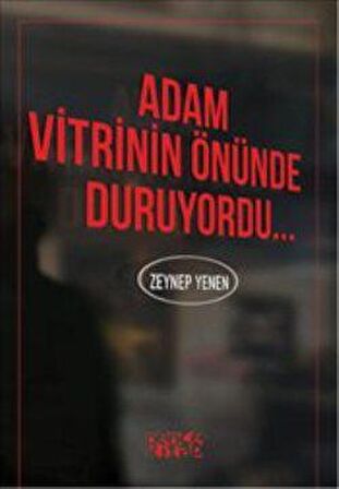 Adam Vitrinin Önünde Duruyordu