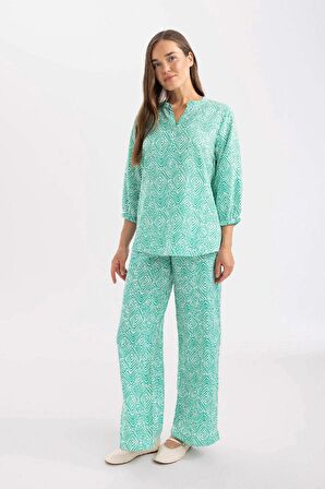 DeFacto Wide Leg Geniş Bol Paça Pantolon Desenli Esnek Belli Paça Yırtmaç Detaylı Cepli C9161AX24SMGN700