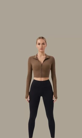 Kadın Kahverengi Uzun Kol Fermuarlı Parmak Geçme Detaylı Dik Yaka Crop Top Bluz – Şık, Rahat ve Kolay Kombinlenebilir
