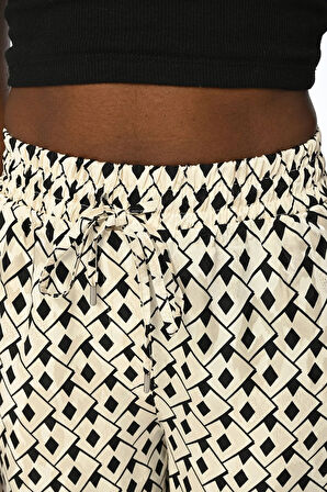 KADIN DESENLİ BELİ LASTİKLİ BOL PAÇA PANTOLON