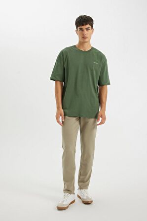 DeFacto Oversize Fit Bisiklet Yaka Sırt Baskılı Kısa Kollu Tişört D2587AX24AUKH493