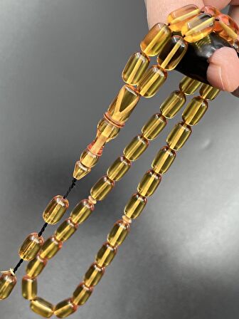 Ateş Kehribar Tesbih Sarı Kapsül Model 7x11mm 33 Tane Sistemli Tane Boşlukları Ayarlanabilir Püskül AK04075.180324
