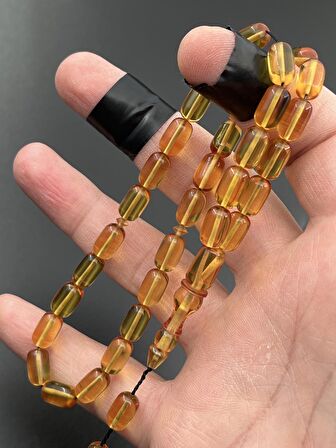 Ateş Kehribar Tesbih Sarı Kapsül Model 7x11mm 33 Tane Sistemli Tane Boşlukları Ayarlanabilir Püskül AK04075.180324
