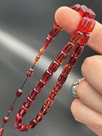 Kırmızı Tonlarda 33’lü Ateş Kehribar Kapsül Kesim Tesbih 7x10 mm Sistemli – AK240230.190425