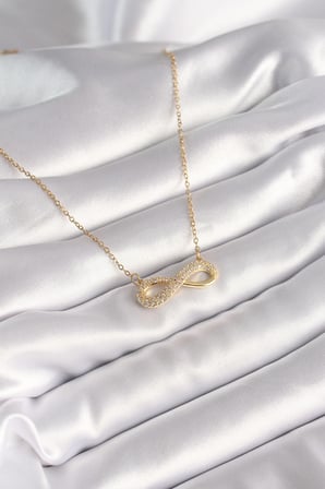 316L Çelik Gold Renk Zincir Zirkon Taşlı Sonsuzluk Model Kadın Kolye