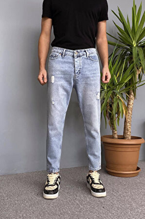 Yırtık Detaylı Açık Mavi Kot Pantolon