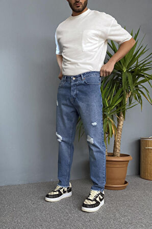 Paçaları Yırtık Detaylı Mavi Kot Pantolon