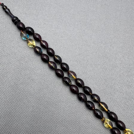 Şeffaf Hareli Usta İşçilikli 8x11mm Sıkma Kehribar Tespih