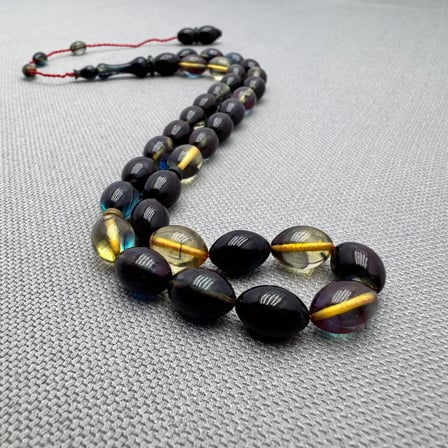Şeffaf Hareli Usta İşçilikli 8x11mm Sıkma Kehribar Tespih